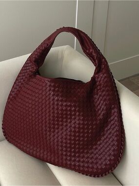 large red woven bag